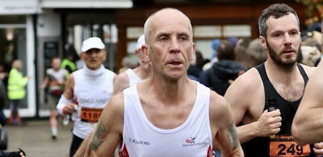 Owen Dare running a marathon for England