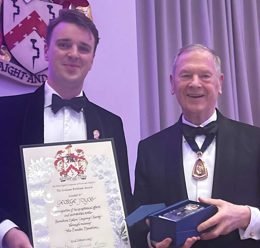 George Joyce being presented with the Graham Kirkham Award by Lord Kirkham himself