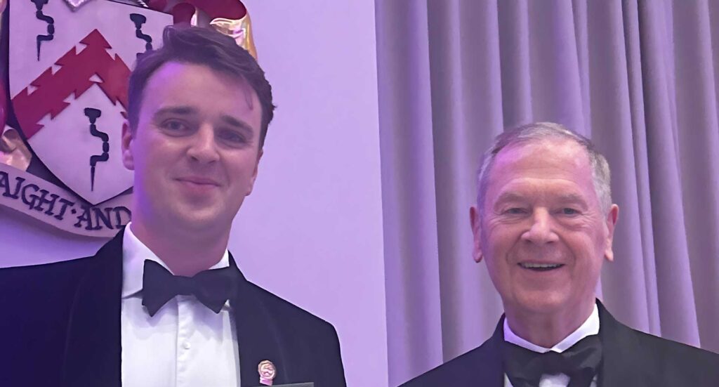 George Joyce being presented with the Graham Kirkham Award by Lord Kirkham himself